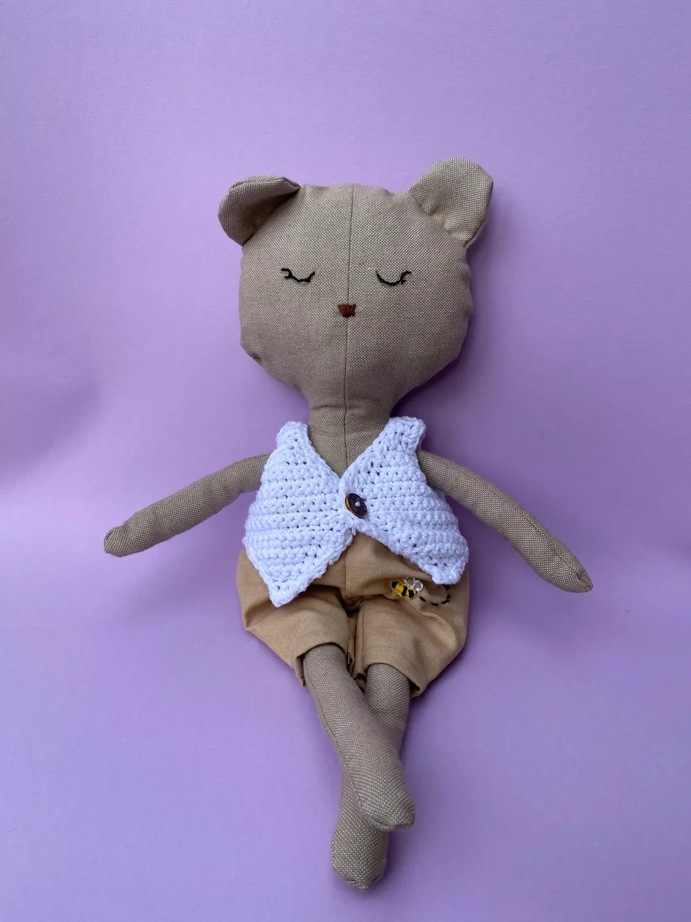 Bear with buttoned waistcoat
