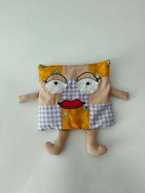 Stress doll with kissing mouth